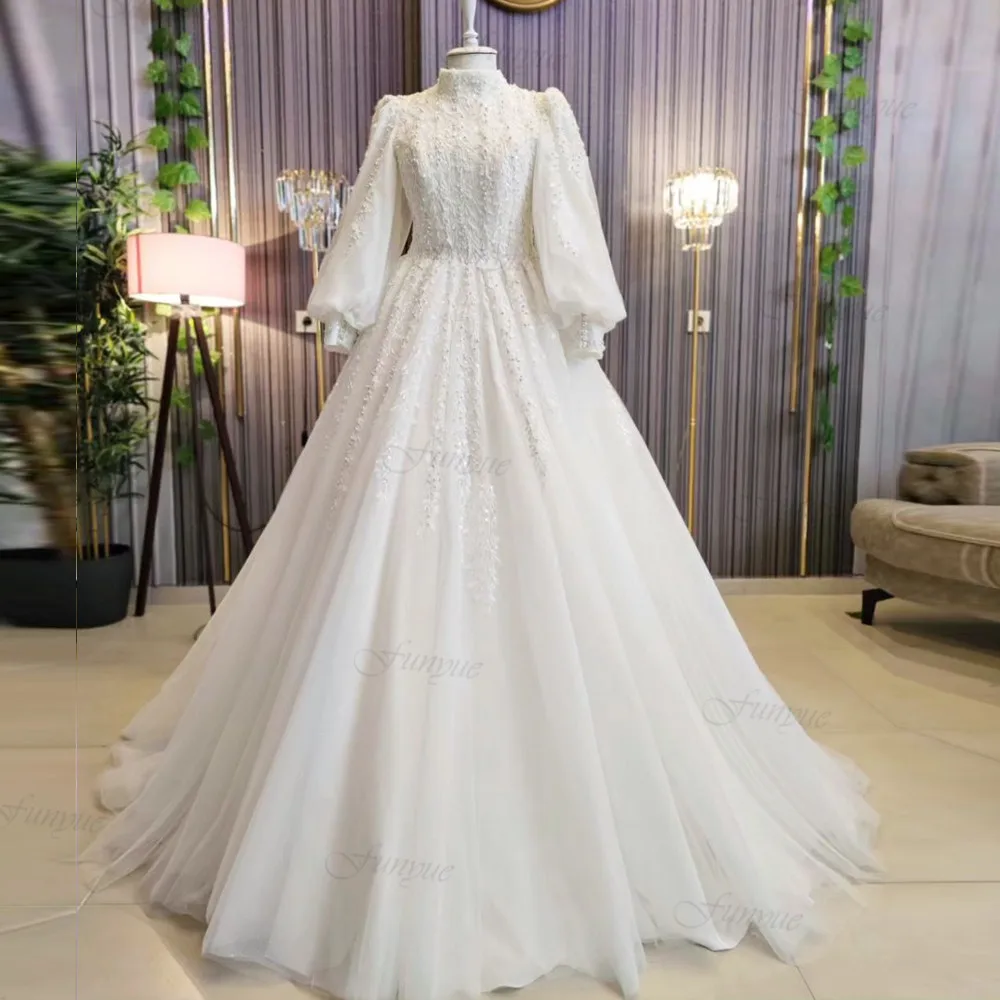 Abito da sposa a maniche lunghe principessa a-line per la sposa perle di pizzo musulmano Dubai abiti da sposa di lusso Robe De Mariée 2024