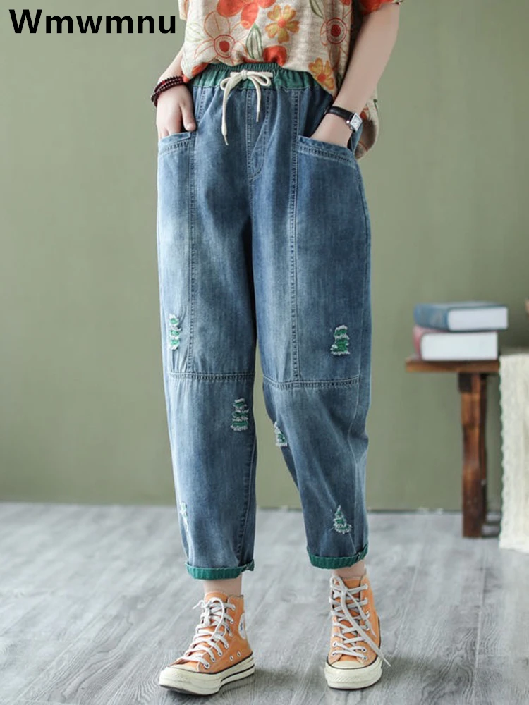 Poszarpane dziury szarawary dżinsowe Streetwear damski koreański luźny spodnie dżinsowe do kostek projekt casualowy Vaqueros nowa koronkowa Up Kot Pantalon