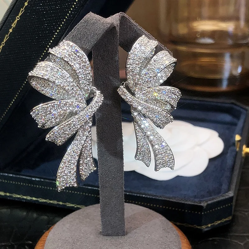 ZAKOL Luxuriöse Voll-Pavé-Zirkonia-Ohrstecker mit Schleifen-Design für Damen, Funkelnde CZ-Knoten-Hängeohrringe, Hochzeits- und Party-Schmuck – Detail 8