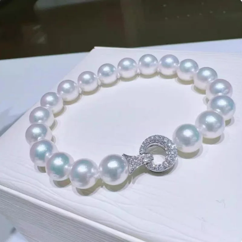 

Сияющий и очаровательный браслет из натурального белого круглого жемчуга Южных морских пресноводных жемчужин AAAA+ 8-9 мм, 7,5-8 дюймов.