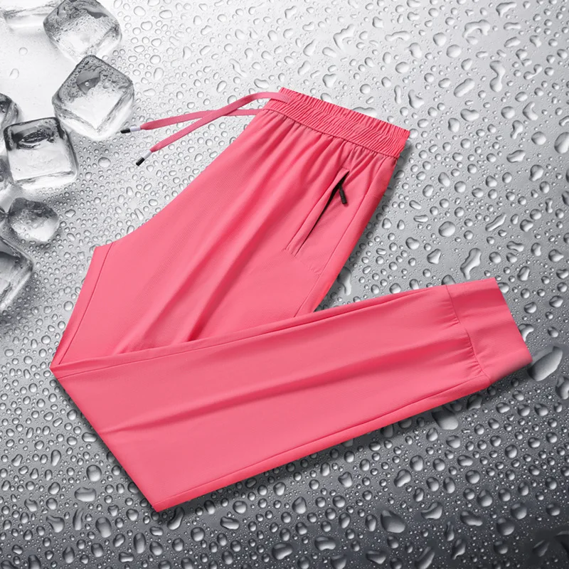 Pantalones casuales finos de seda helada, de secado rápido y frescos tanto para hombres como para mujeres, con material elástico para ropa deportiva relajada