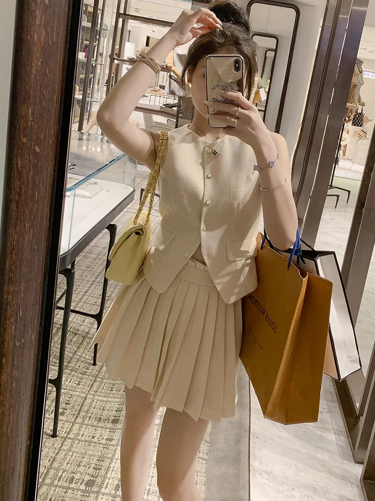 

Elegant Summer Fashion Set for Women with Sleeveless Top And Pleated Skirt Two-Piece Ensemble Small Fragrance Style