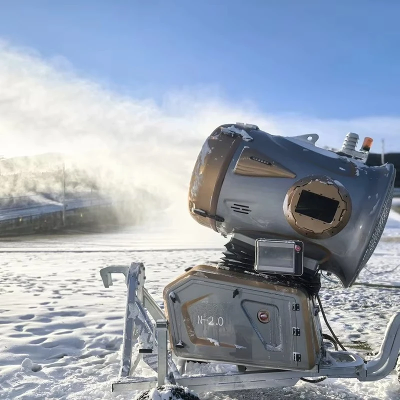 Automatic Three Wheel Snow Making Machine Outdoor Ski Resort Artificial Snow Cannon Gun Shed