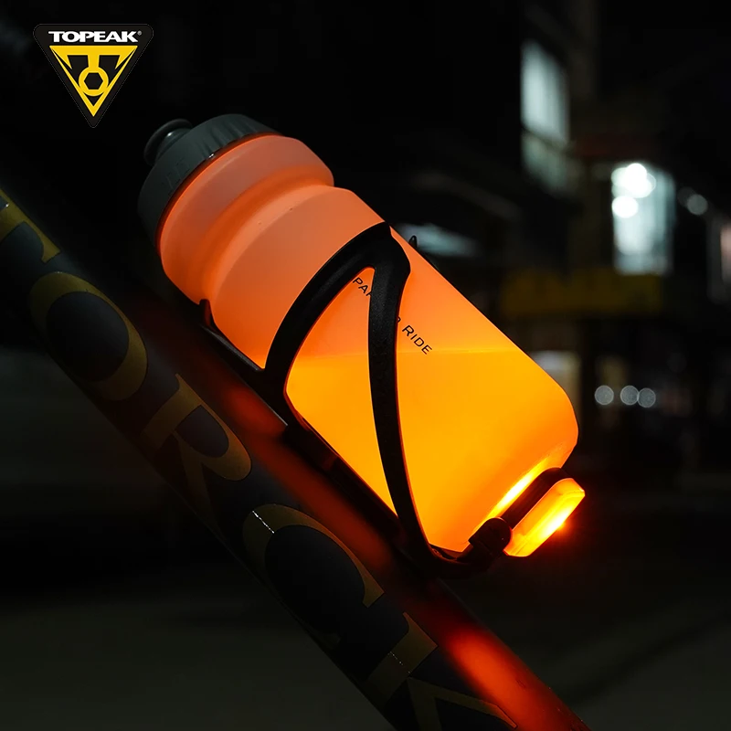 

Topeak Cycling Water Bottle with An Ingenious Safety Light Integrated the Ninja+ Bottle Cage Provides 360° Visibility Ipx6