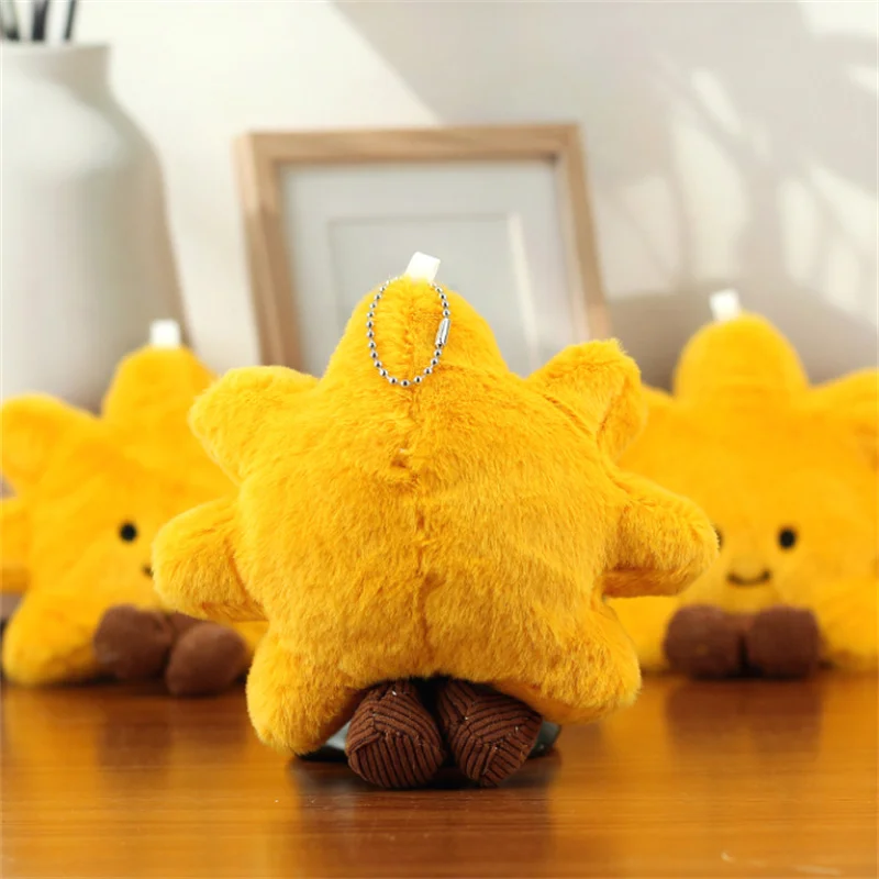 ตุ๊กตาดอกทานตะวันยิ้มน่ารักและสร้างสรรค์ ของเล่นตุ๊กตาขนนุ่ม พวงกุญแจ ของตกแต่งกระเป๋าเป้สะพายหลัง ของขวัญจากตู้คีบตุ๊กตา