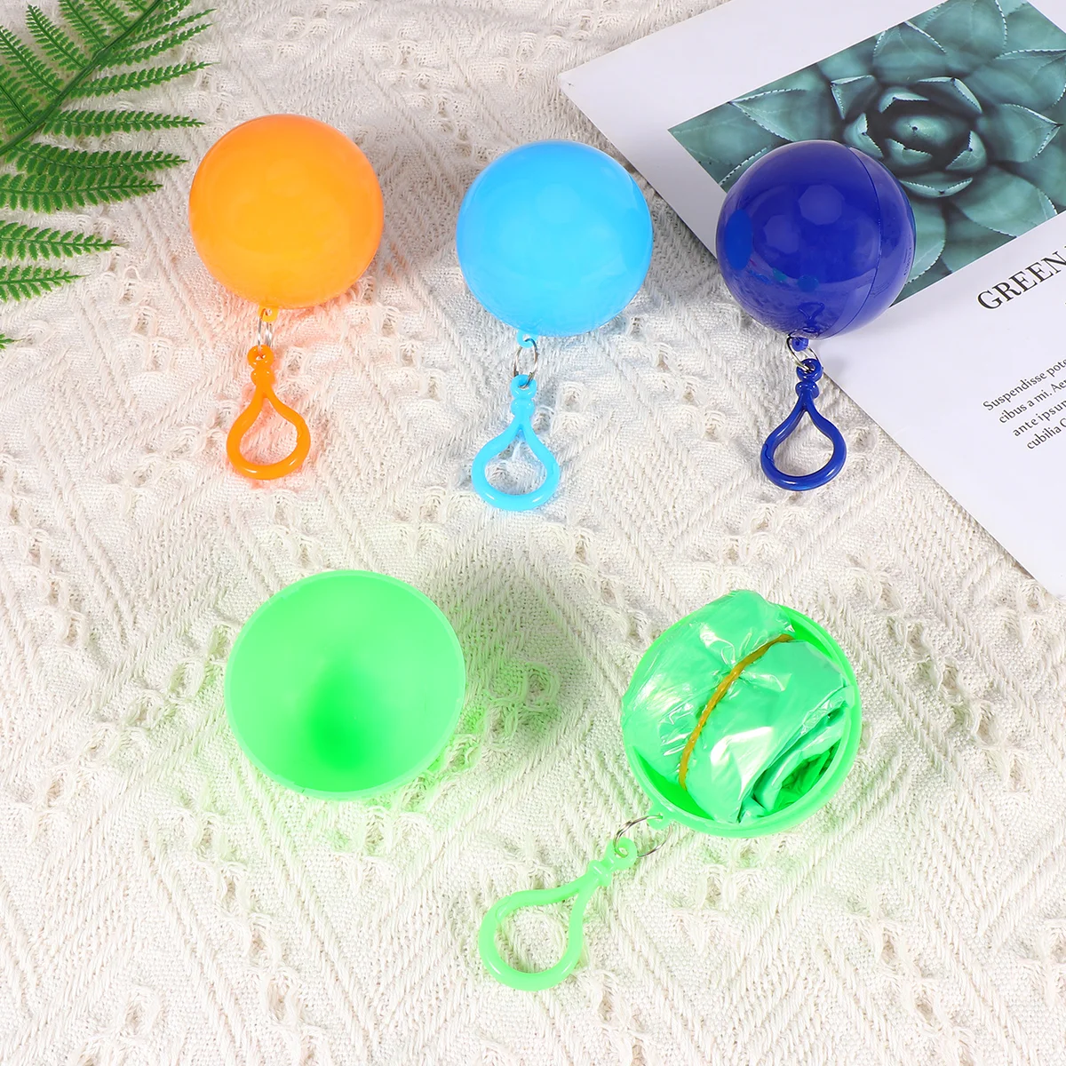 

4 Pcs Disposable Ball Poncho Unisex Keyring Ball Raincoat Rain Poncho Rainwear Keyring Ball Practical ()