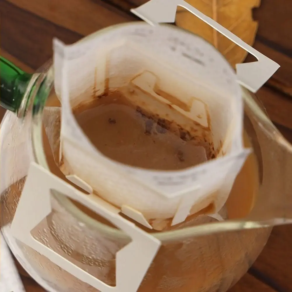 

50Pcs Non-woven Fabric Coffee Filter Paper Bag Thickened Eco-Friendly Hanging Ear Drip Coffee Bags Single Serve