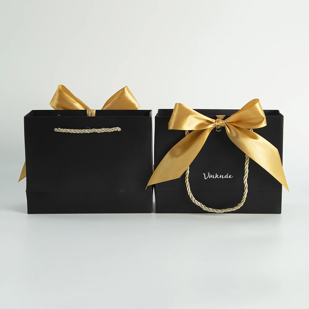100Pcs Custom Logo Black Paper Shopping Bags with Handle Gold Bow Boutique Clothes Merchandise Wedding Party DIY Gift Packaging