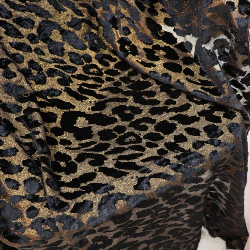 The fabric of cheongsam and dress is made brocade velvet with golden rotten flowers