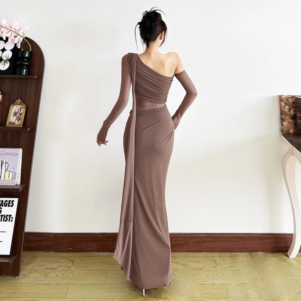 ชุดเดรสยาวทรงหรูหราแบบรัดรูปสำหรับผู้หญิง คอเฉียงแบบไม่สมมาตร เปิดหลัง แขนยาว ตกแต่งด้วยริบบิ้น เหมาะสำหรับงานพรอมหรืองานปาร์ตี้