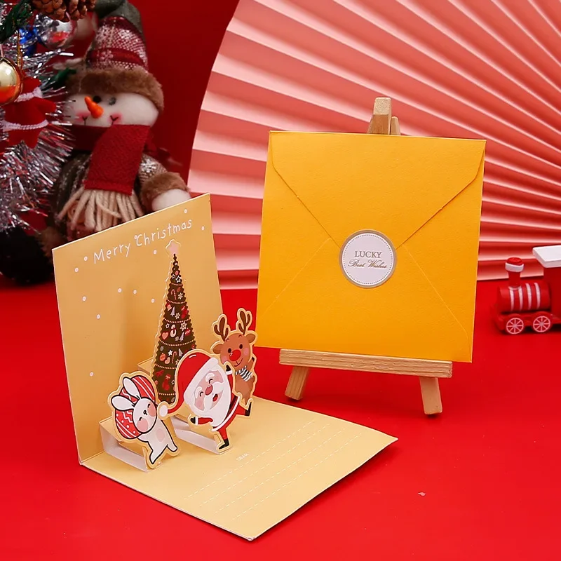 Merry Christmas Cards 3D Pop-up Greeting Cards with Envelope Santa Claus Snowman Laser Cut Xmas Happy New Year Greeting Cards