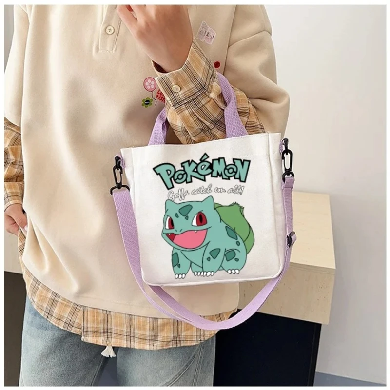 

Anime Pokemon Canvas Crossbody Bag Pikachu Eevee Bulbasaur Cartoon Pattern Print Handbag Fashion Portable Travel Storage Bag