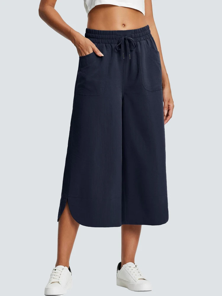 سراويل نسائية صيفية قابلة للتمدد مستقيمة الساق واسعة الساق لعام 2025 ، ملابس خارجية غير رسمية من الحرير الجليدي بسبعة سنتات ، فضفاضة ومسامية