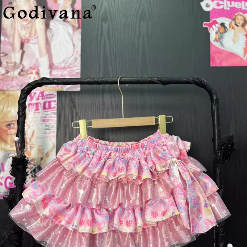 الحلو الأصلي لطيف الوردي تنورة المرأة المطبوعة Y2K القوس تصميم رقيق كعكة اللباس الإناث الصيف الشارع ارتداء الأميرة تنورة صغيرة