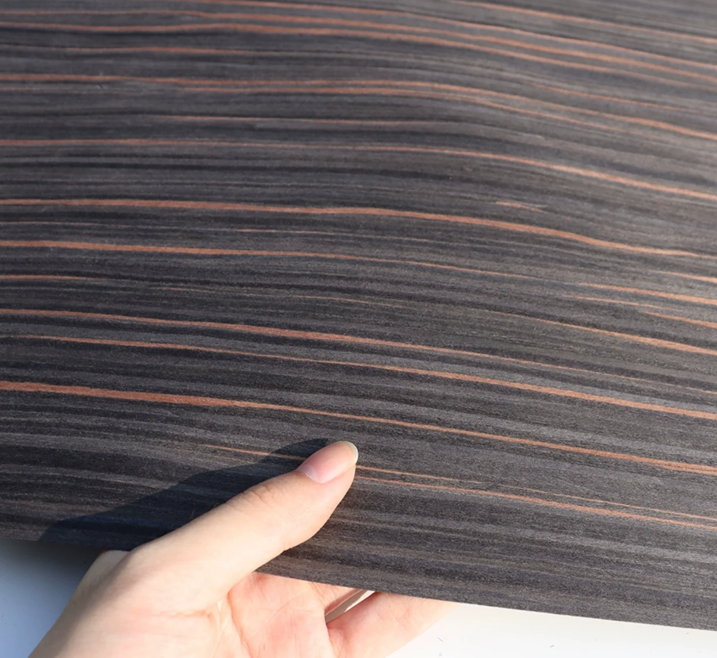 

Size:2.5x0.58meter Thick:0.25mm Noble Black Gold Technology Wood Skin Home Speaker Car Interior Veneer Decoration