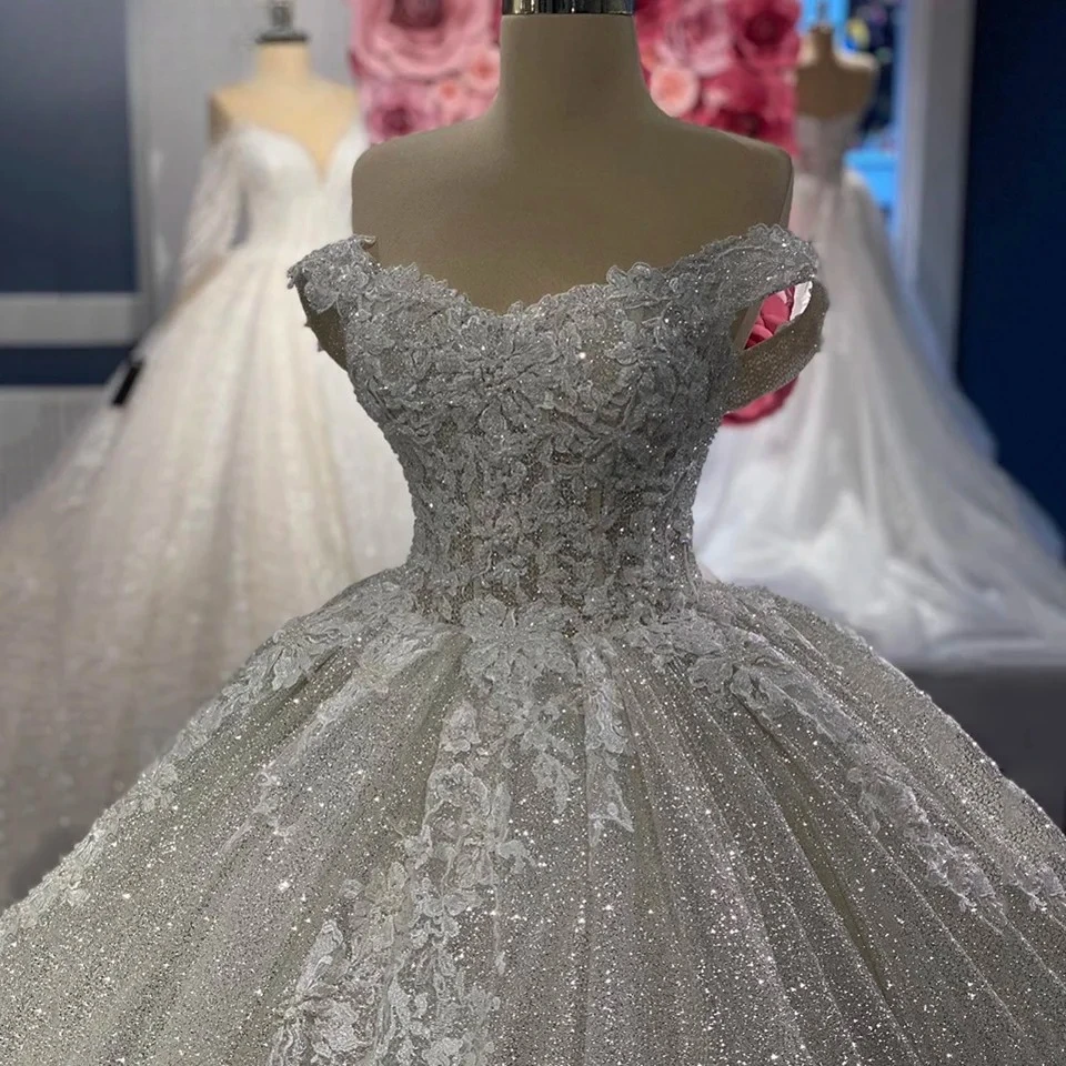 

Customized V-Neck Shiny Off The Shoulder Appliques Wedding Dress 2026 Ball Gown Floor Length Sweep Train Lace Up Bridal Gown