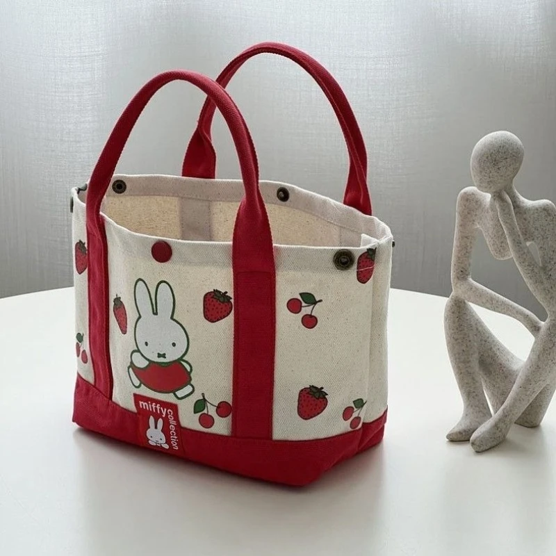 

New Kawaii Miffy Strawberry Printed Thick Canvas Shoulder Bag Bento Box Handbag Girl Gift Suitable for Outdoor Use