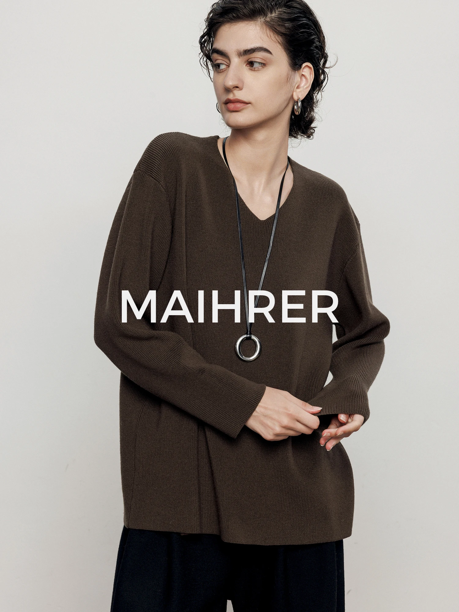 

Ladies Casual Loose Long Sve V-Ne Knitted T-irt Anti-Ball Weary Sle Autumn Winter Slimming Comfortable Top