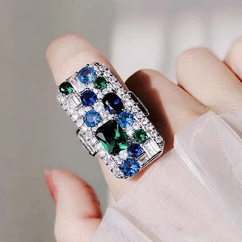 Huitan Geometrische rechteckige Ringe, vollständig mit funkelnden grünen/blauen Zirkonia besetzt, luxuriöser, trendiger Hochzeitsschmuck für Frauen