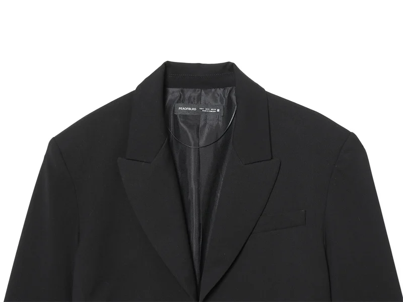 Veste femme 2025 hiver nouveau Blazer court noir à manches longues avec épaules rembourrées et détails plissés élégant et tendance