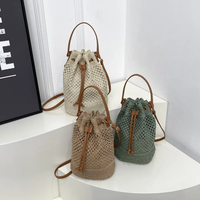 

Simple bucket bag, feminine and versatile, hollow straw crossbody bag, fashionable drawstring hand-held shoulder bag