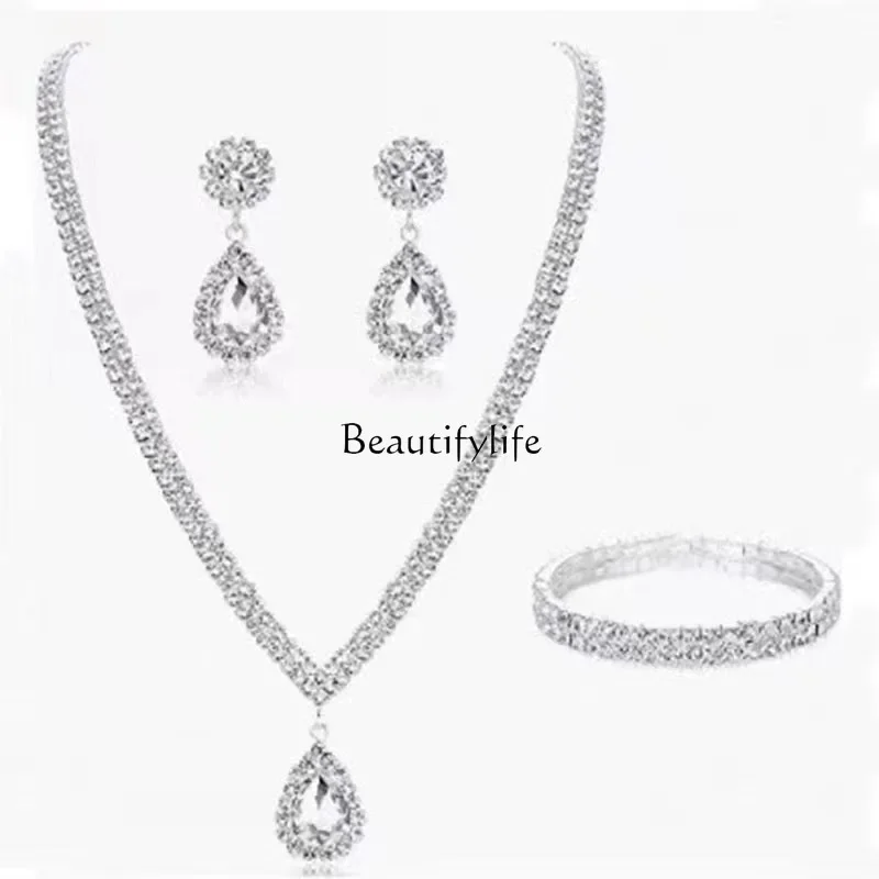 

Flash diamond inlaid with diamonds, crystal water drop collarbone chain, earrings, bracelet 3-piece set.