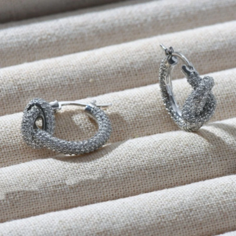 

Fashion Europe Copper Plated Platinum Zircon Full Diamond Knotted Earrings Woman Top Quality Jewelry