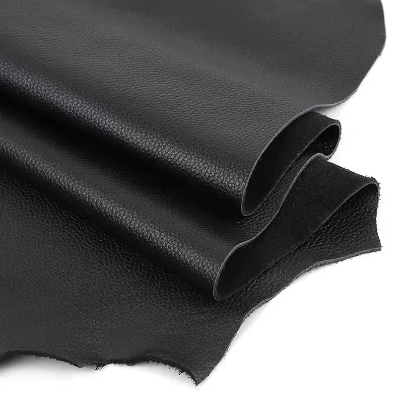 Black cowhide leather lychee pattern soft bag sofa head layer cowhide fabric leather fabric whole piece leather fabric