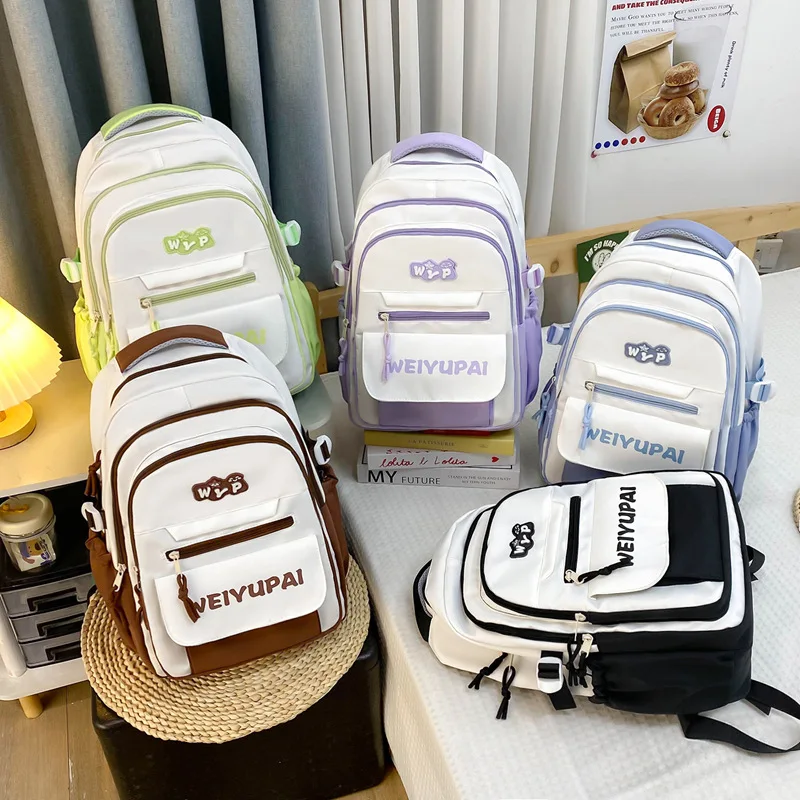 

Nylon lightweight color-blocking student schoolbag, large-capacity travel backpack, multi-layer waterproof backpack