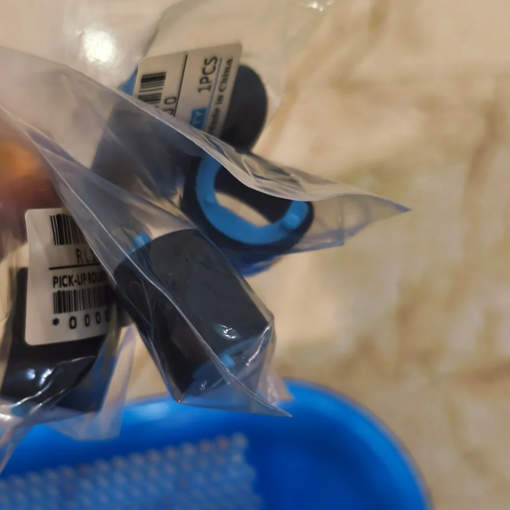 10 ชิ้น ลูกกลิ้งดึงกระดาษ RL1-2593-000 สำหรับเครื่องพิมพ์ HP 1102 1132 1212 P1102 M1132 M1212nf M1214nfh M1217nfw P1102w และ Canon MF3010