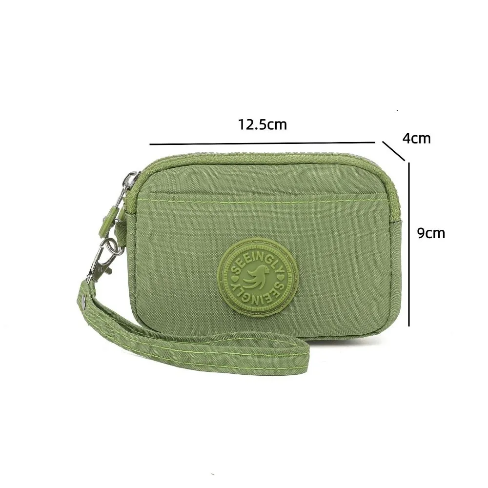 Dompet Wanita Warna Solid Portabel dengan Tali Penyandang Tempat Kartu Kredit Lapisan Ganda Dompet Koin Nilon Tahan Air Wanita