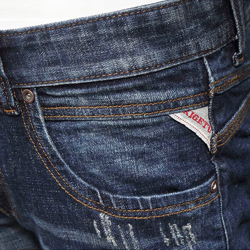 Jeans da uomo di nuova moda firmati Jeans strappati Slim Fit elasticizzati blu retrò uomo pantaloni in Denim Casual Vintage stile italiano Hombre