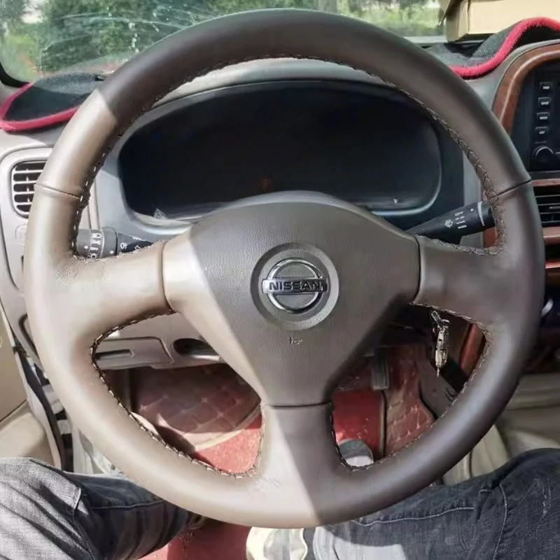

Чехол на руль для Nissan Navara Pickup D22, ручной работы, из натуральной кожи темно-коричневого цвета.