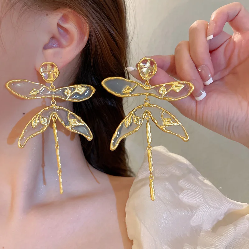 

Silver needle irregular geometry leaves dragonfly fringe earrings in ancient style small fresh ear nails retro exaggerated earri