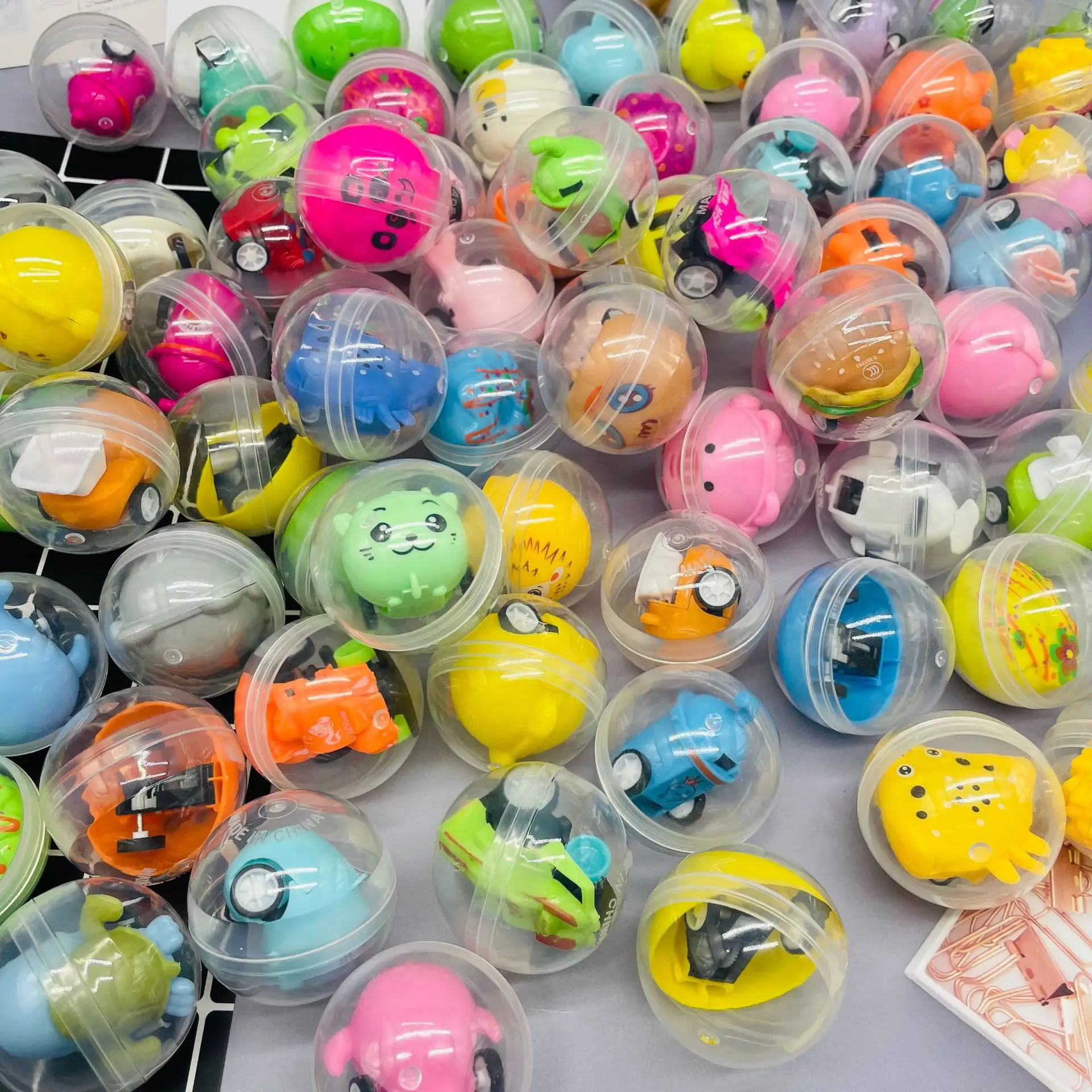 45mm diameter transparent plastic ball capsules toy with inside mini small dolls toys for vending machine