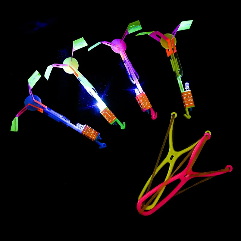 Luce a LED Fionda Elastico Catapulta Elicottero Giocattoli volanti Divertente Freccia Razzo Bambini Festa di compleanno Bomboniere Regalo Pinata Riempitore