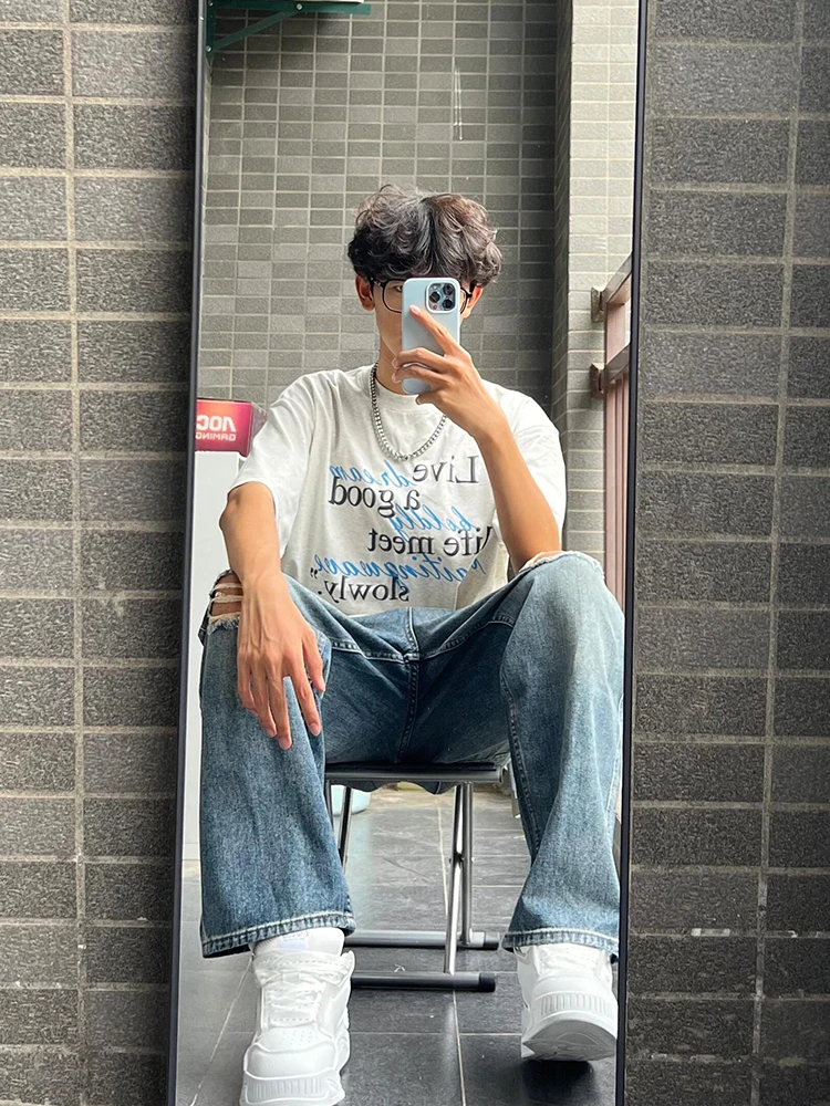 بنطلون جينز أزرق ممزق للرجال صيفي فضفاض مستقيم غير رسمي بنطلون طويل مغسول عتيق ملابس شبابية مقاومة للقطن والبوليستر