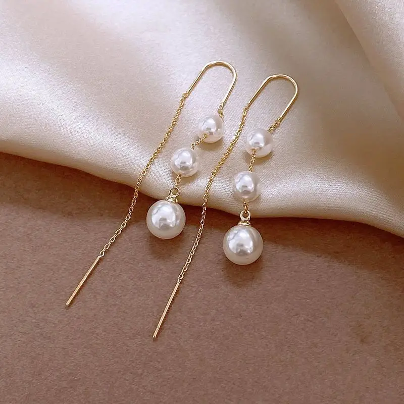

Japanese and Korean trend simple stud earrings pearl long temperament earrings show face thin fashion versatile ear jewelry