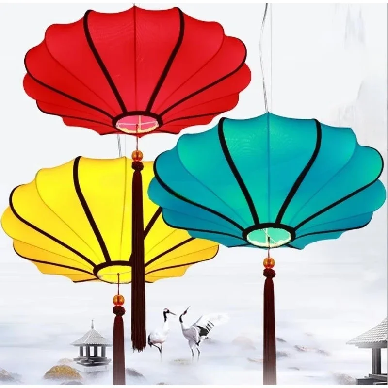 Hanging lit fabric lanterns