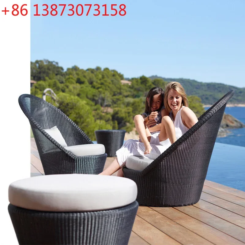 Nordic courtyard high backrest rattan table and chair sofa hotel outdoor leisure rattan chair tea table three-piece combination