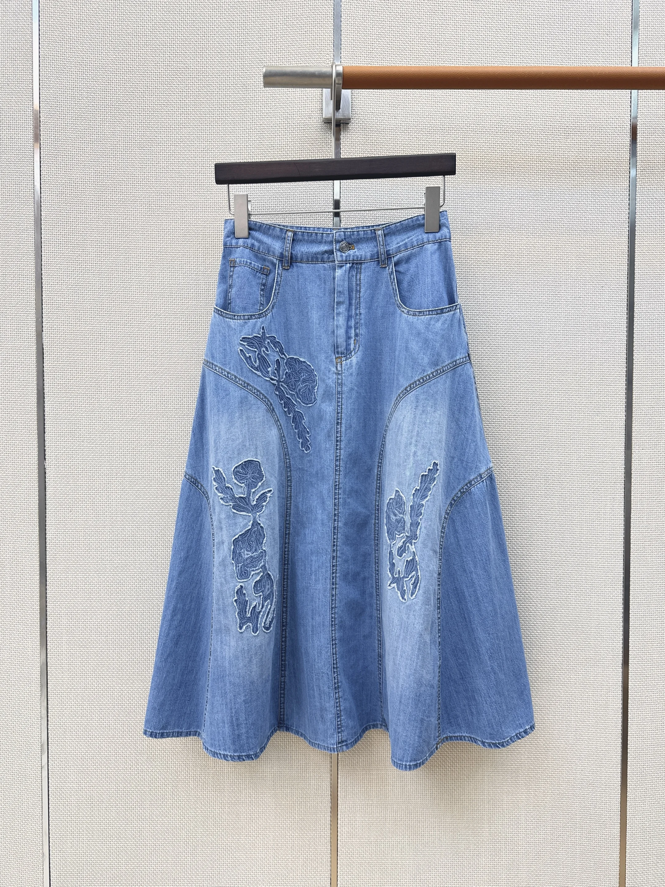 Washed blue spliced denim half length long skirt with floral embroidery and large swing A-line mid length umbrella skirt