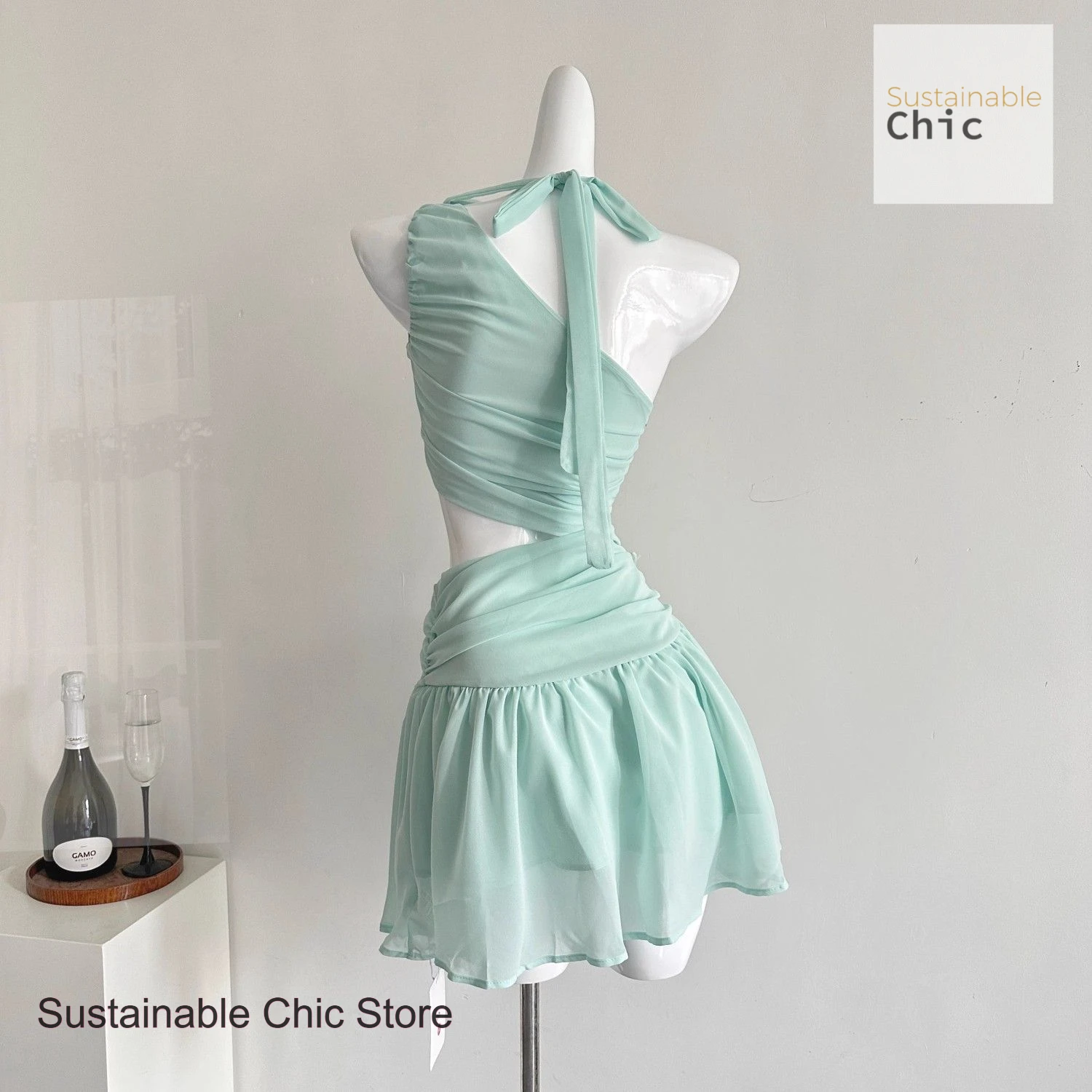 Green diagonal shoulder dress women's summer new French fashion gentle and sexy pure wind advanced design sense gauze skirt.