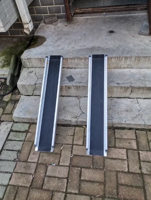 Assist Wheelchair with Step Artifact, Retractable Aluminum Ramp