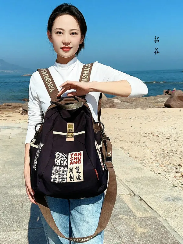mochila-casual-de-tela-de-algodon-para-mujer-bolso-de-viaje-versatil-bolso-de-hombro-moderno-de-doble-uso-forro-de-poliest