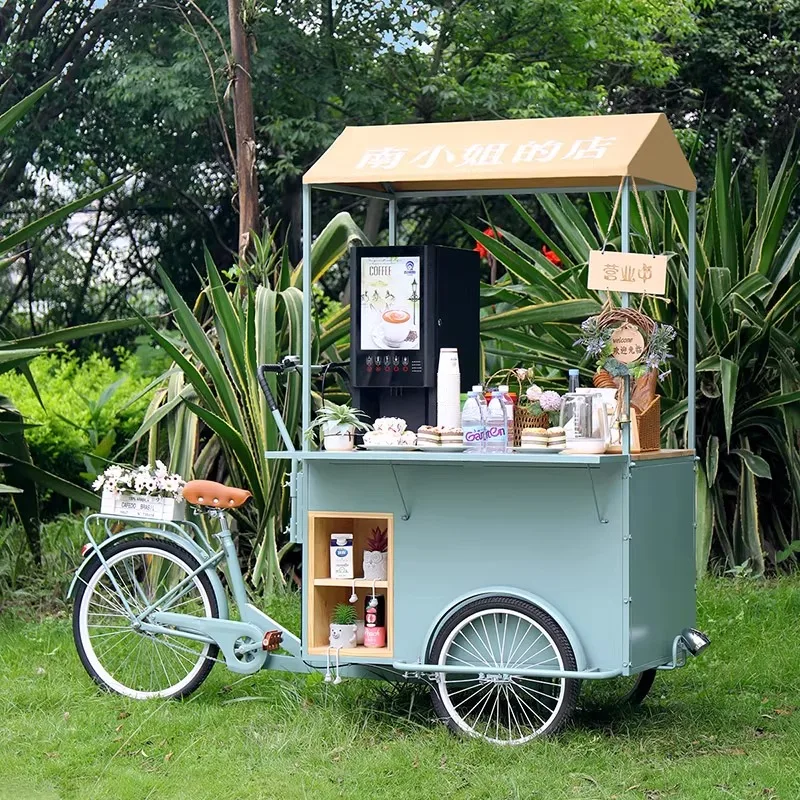 Outdoor mobile reverse riding three-wheeled wrought iron flower car scenic booth car
