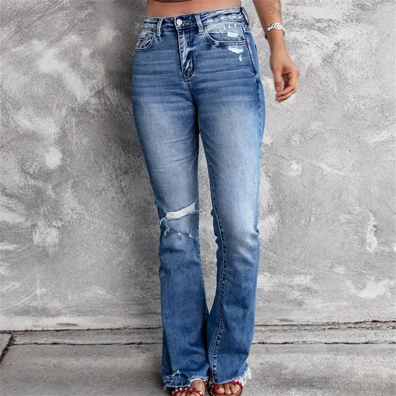 Vintage zepsute dziury rozkloszowane dżinsy Streetwear wysokiej talii zmywalne bawełniane spodnie dżinsowe spodnie z guzikami dla kobiet w nowym amerykańskim stylu