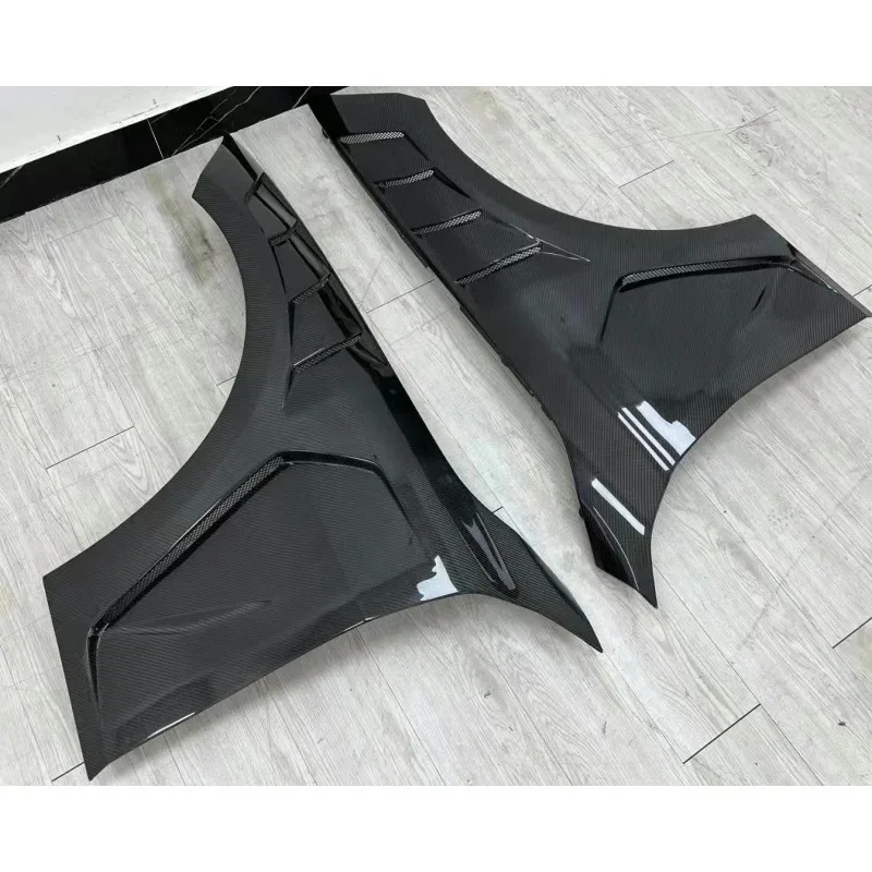 

Комплект расширенных крыльев из перфорированного карбона Super Factory Sui для BMW 4 серии G22 G23 (комплект из двух штук)