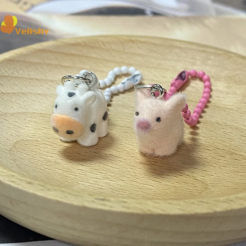 ثلاثية الأبعاد يتدفقون الحيوان سلسلة مفاتيح قصيرة صغيرة الراتنج رقيق كيرينغ حقيبة أنيقة قلادة حقيبة سماعة الاذن سحر حامل مفتاح السيارة زوجين الهدايا