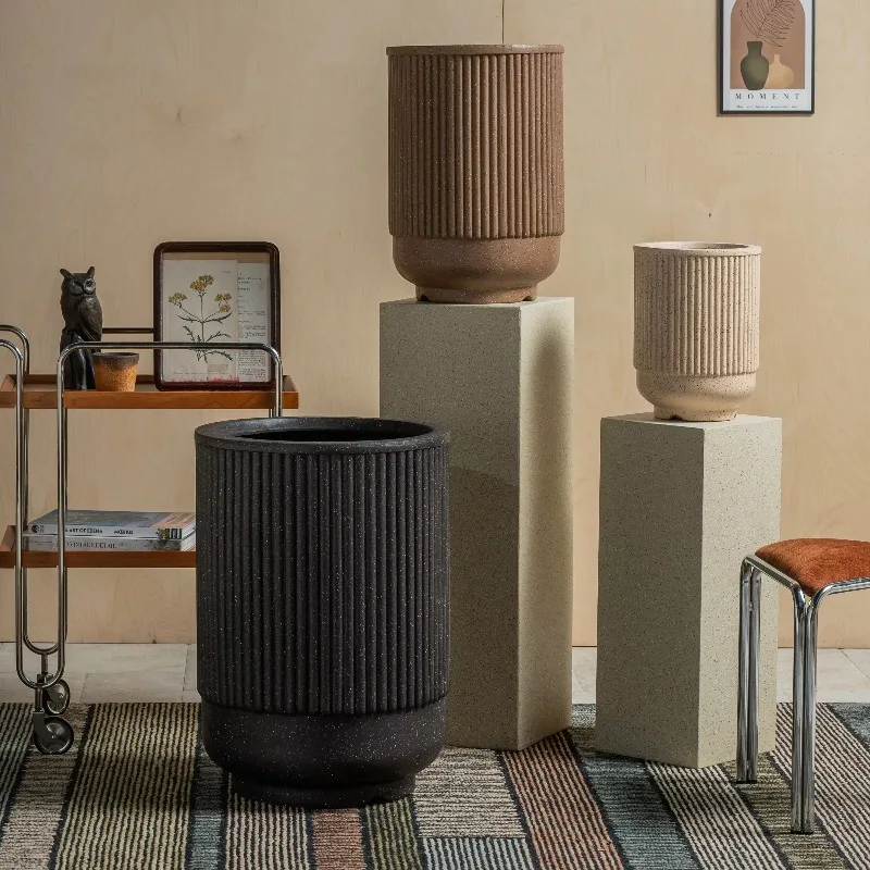 

Large indoor and outdoor concrete fibre clay planters with drainage holes for home and garden floral displays