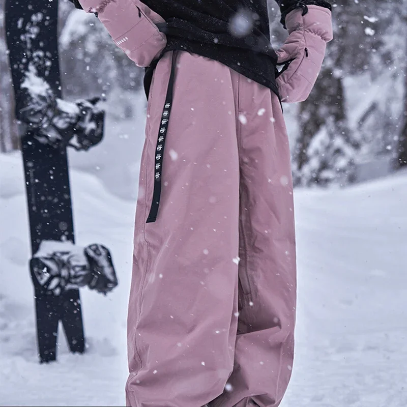 

2025 New Winter Solid Women Outdoor Snowboarding Pants Windproof Waterproof Warm Loose Pant Men Sports Polyester Adult Pant